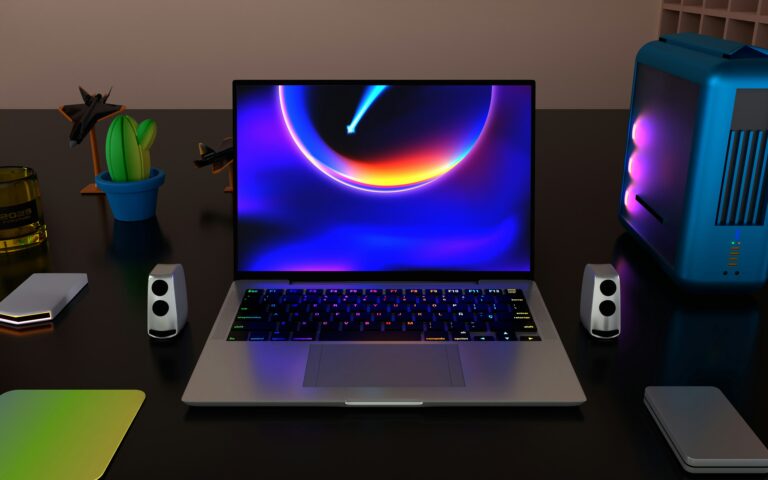 Portátil moderno con iluminación futurista en escritorio tecnológico para guía de compra 2026